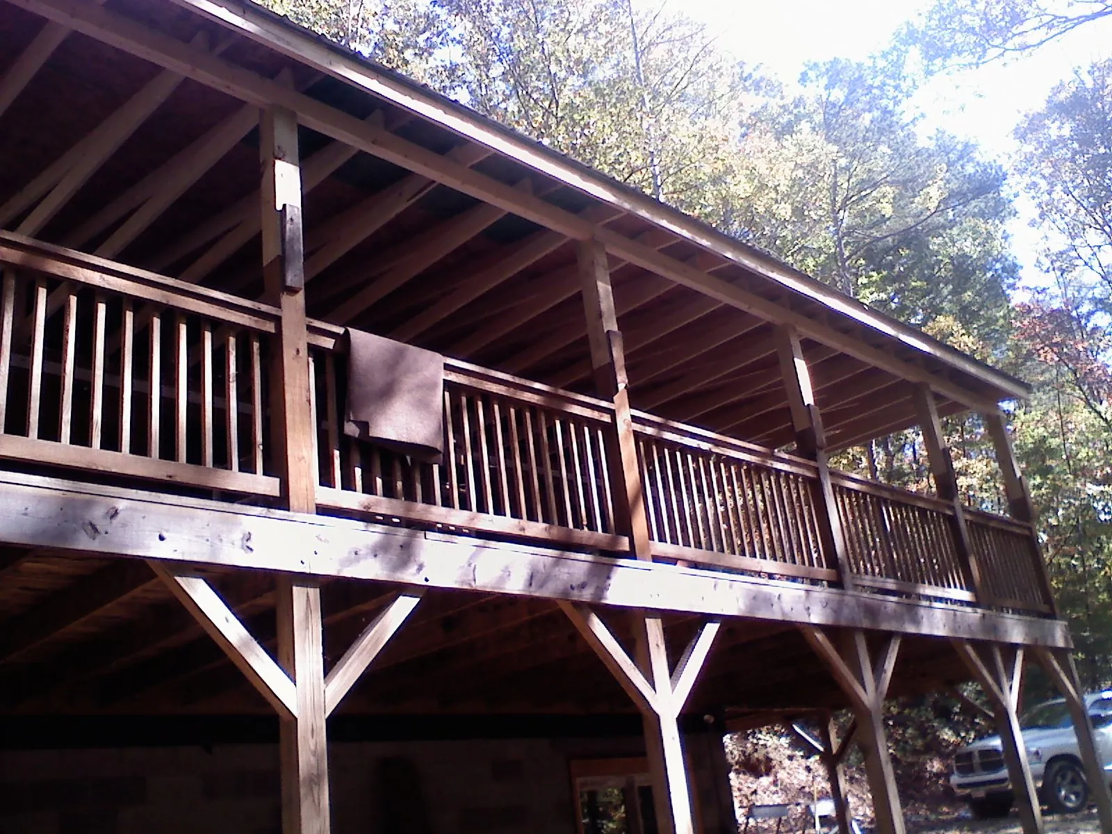 Timber framing under a new elevated porch and deck — Roof Leak Repair in Dawson Springs by Roofing Brothers